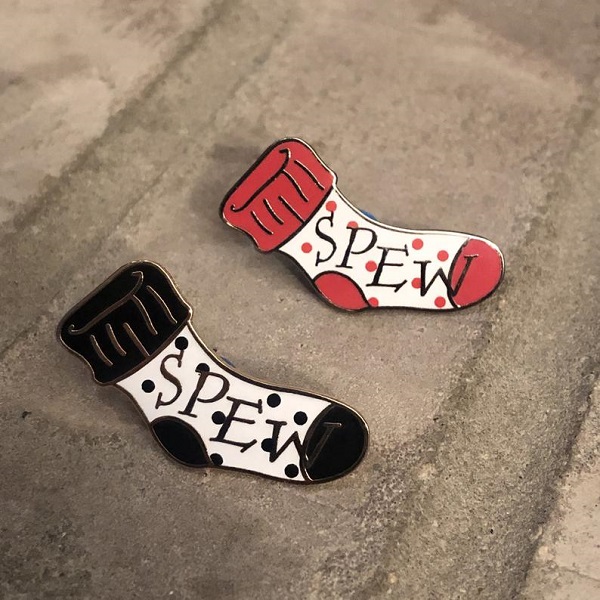 SPEW sock in red or black enamel pin